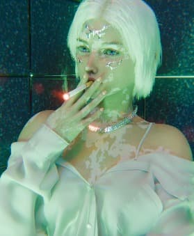 3D render: platinum-haired figure smoking under green light